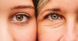 Close up on eyes of mother and daughter faces next to one another, Ophthalmology